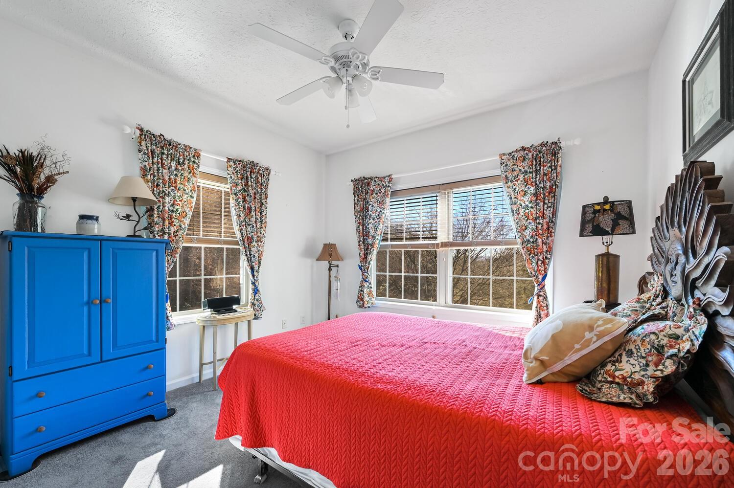 2 Ruffed Grouse Drive Weaverville, NC 28787 - Photo 27 of 44 a bedroom with a bed and a large window with the outer view