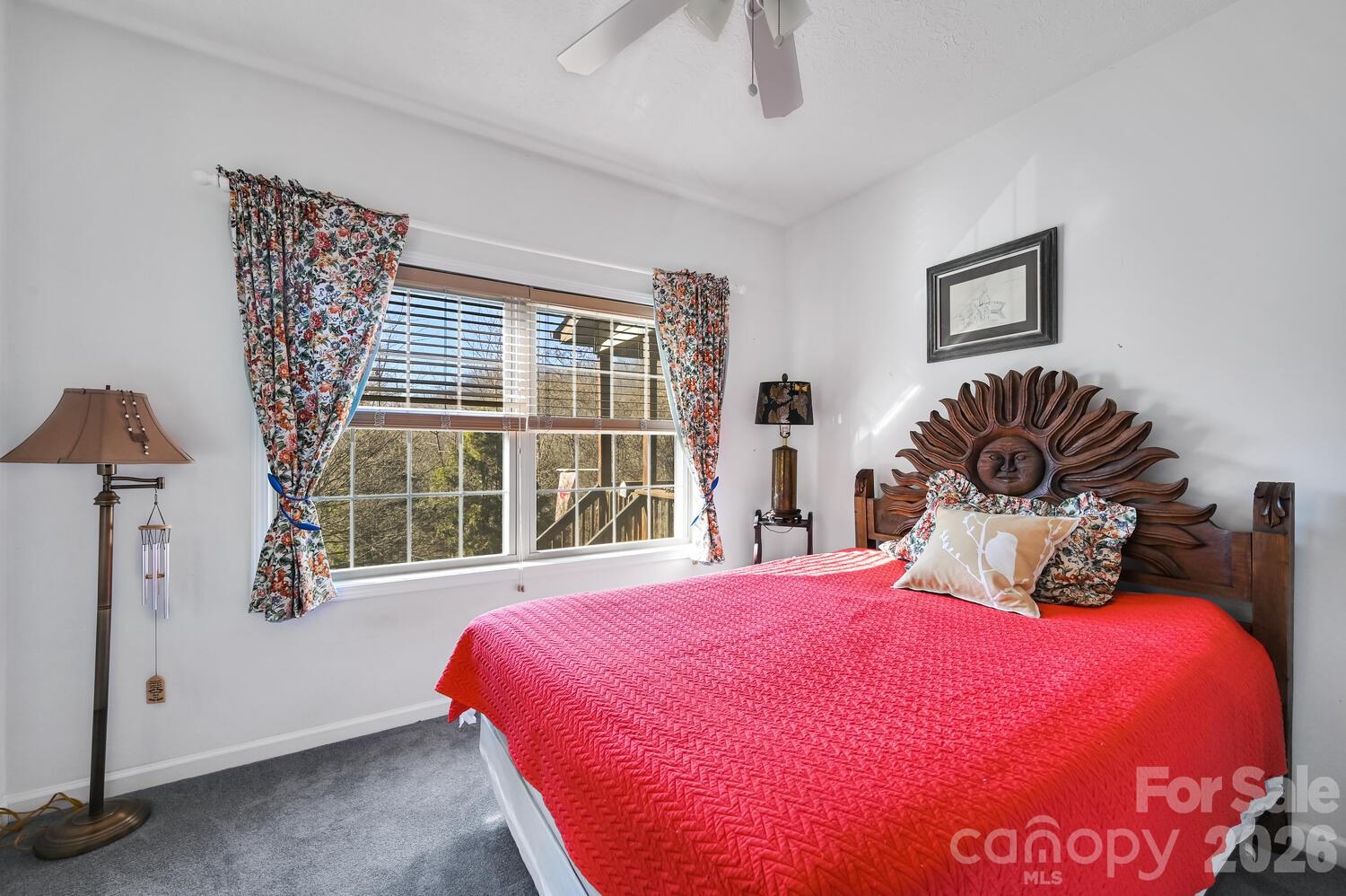 2 Ruffed Grouse Drive Weaverville, NC 28787 - Photo 28 of 44 a bedroom with a bed and a potted plant