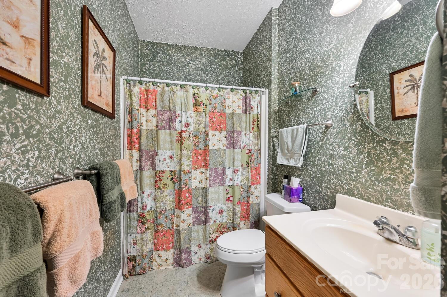 2 Ruffed Grouse Drive Weaverville, NC 28787 - Photo 29 of 44 a bathroom with a sink toilet and shower
