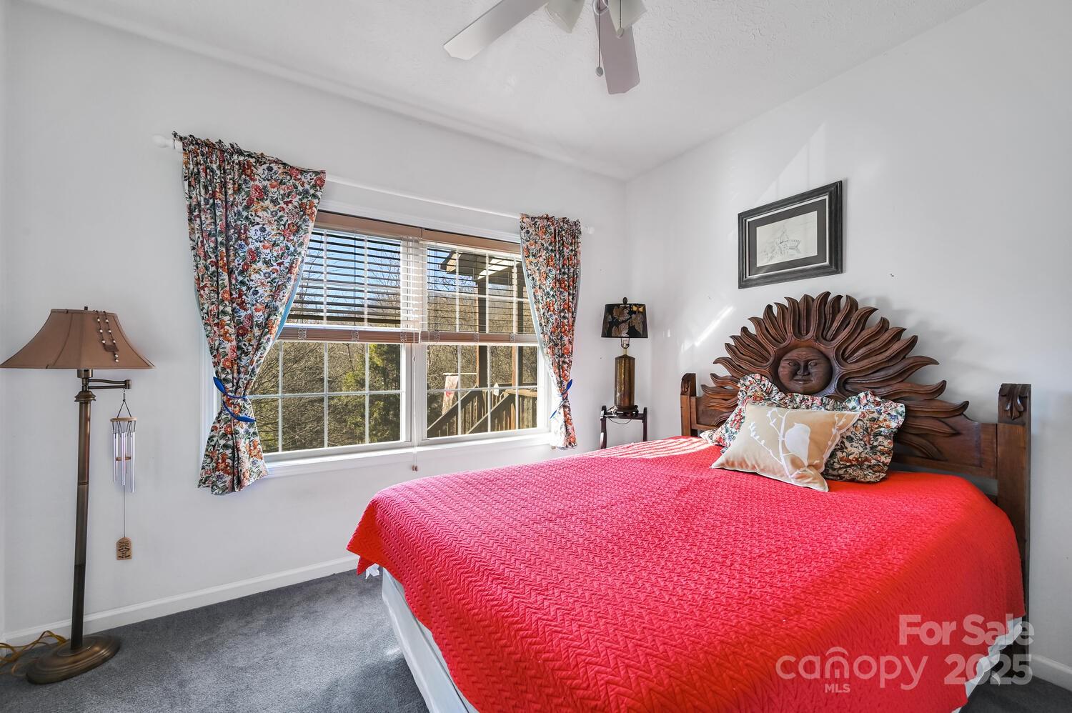 2 Ruffed Grouse Drive Weaverville, NC 28787 - Photo 30 of 44 a bedroom with a bed and a potted plant