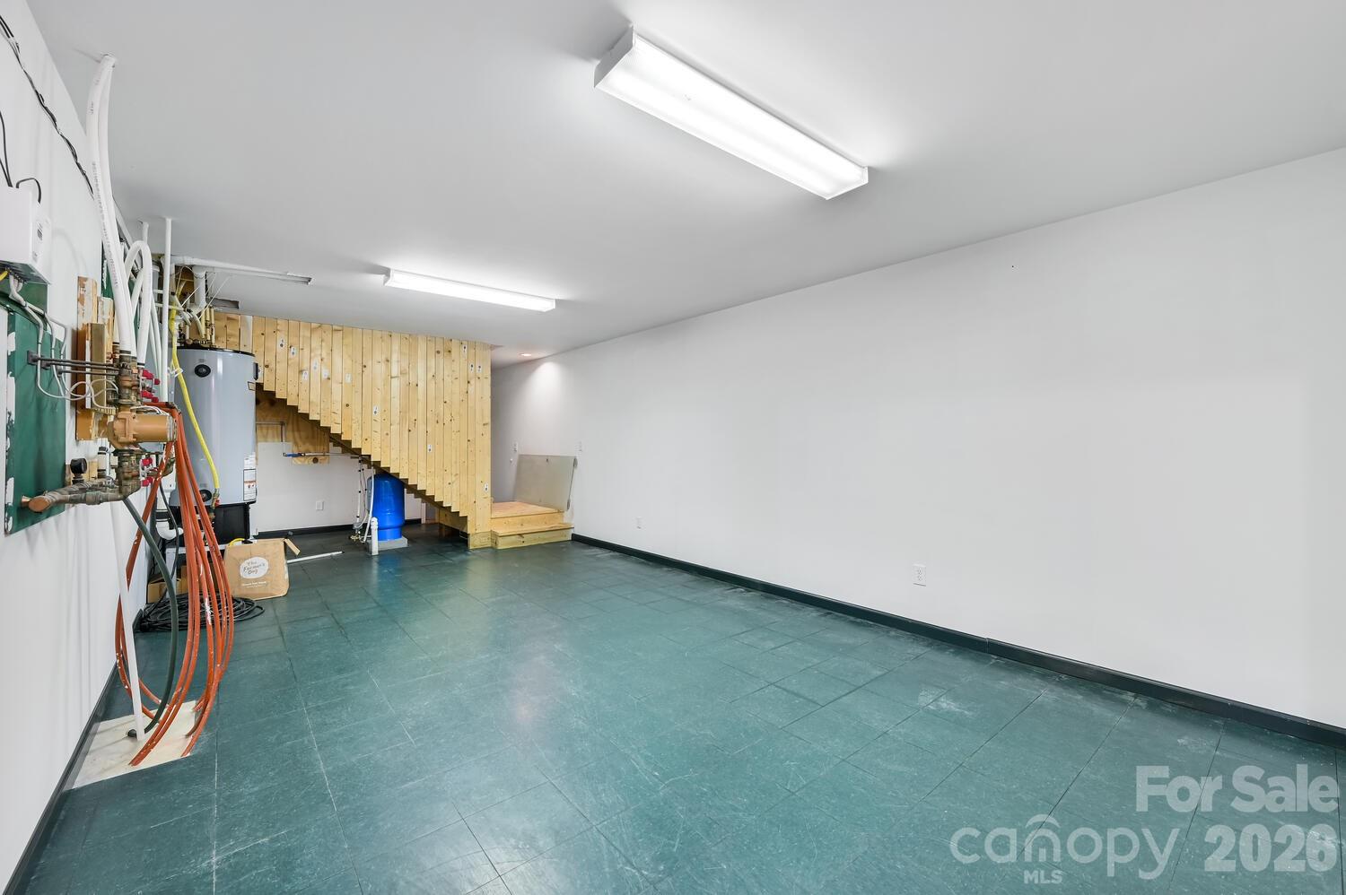 2 Ruffed Grouse Drive Weaverville, NC 28787 - Photo 36 of 44 a view of an empty room with stairs