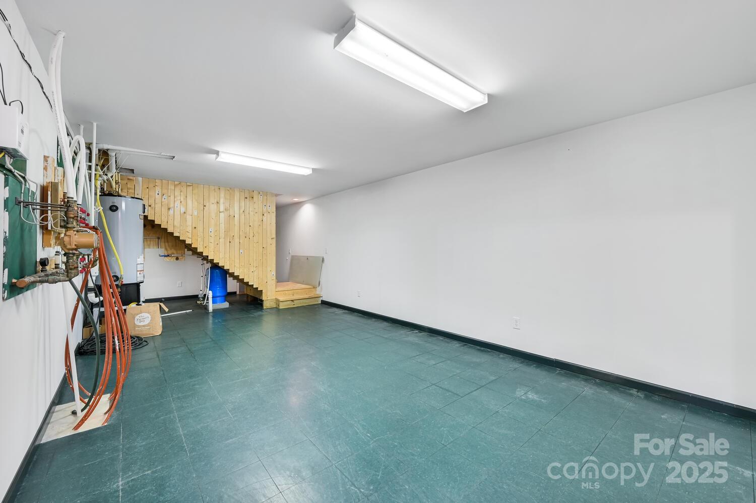 2 Ruffed Grouse Drive Weaverville, NC 28787 - Photo 38 of 44 a view of an empty room with stairs
