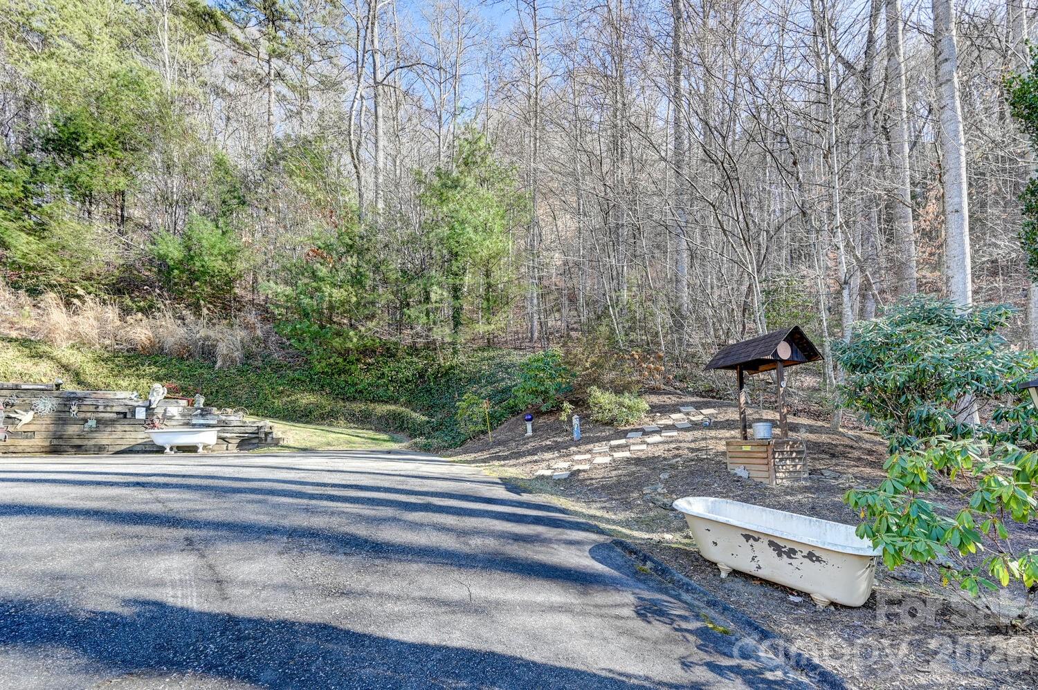 2 Ruffed Grouse Drive Weaverville, NC 28787 - Photo 41 of 44 a backyard of a house with lots of green space
