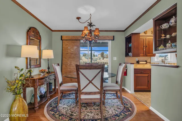 a view of a patio with chairs and a table