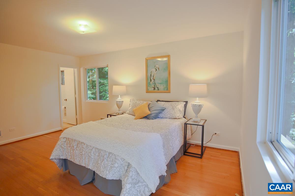 1514 Trailridge Road Charlottesville, VA 22903 - Photo 11 of 23 a bedroom with a bed and a night stand