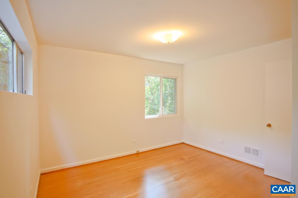 1514 Trailridge Road Charlottesville, VA 22903 - Photo 14 of 23 an empty room with a window