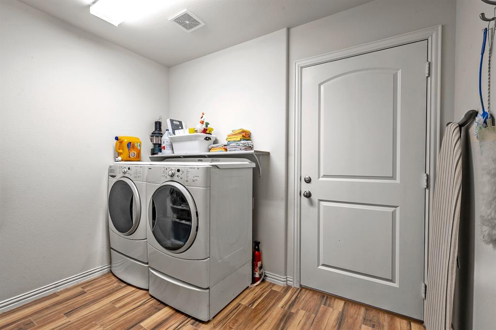 1209 Sherman Street Tioga, TX 76271 - Photo 40 of 40 a utility room with dryer and washer