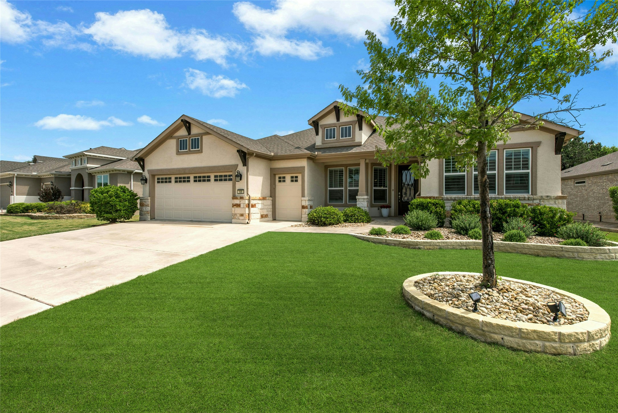 105 Marfa Cove Georgetown, TX 78633 - Photo 3 of 36 a front view of a house with a yard