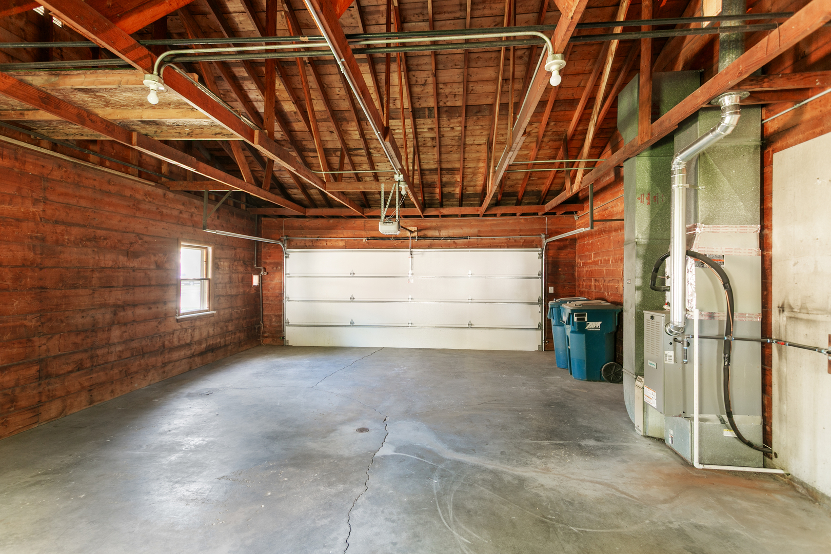 1431 West Vanmeter Street Kankakee, IL 60901 - Photo 18 of 19 a view of a room with wooden walls