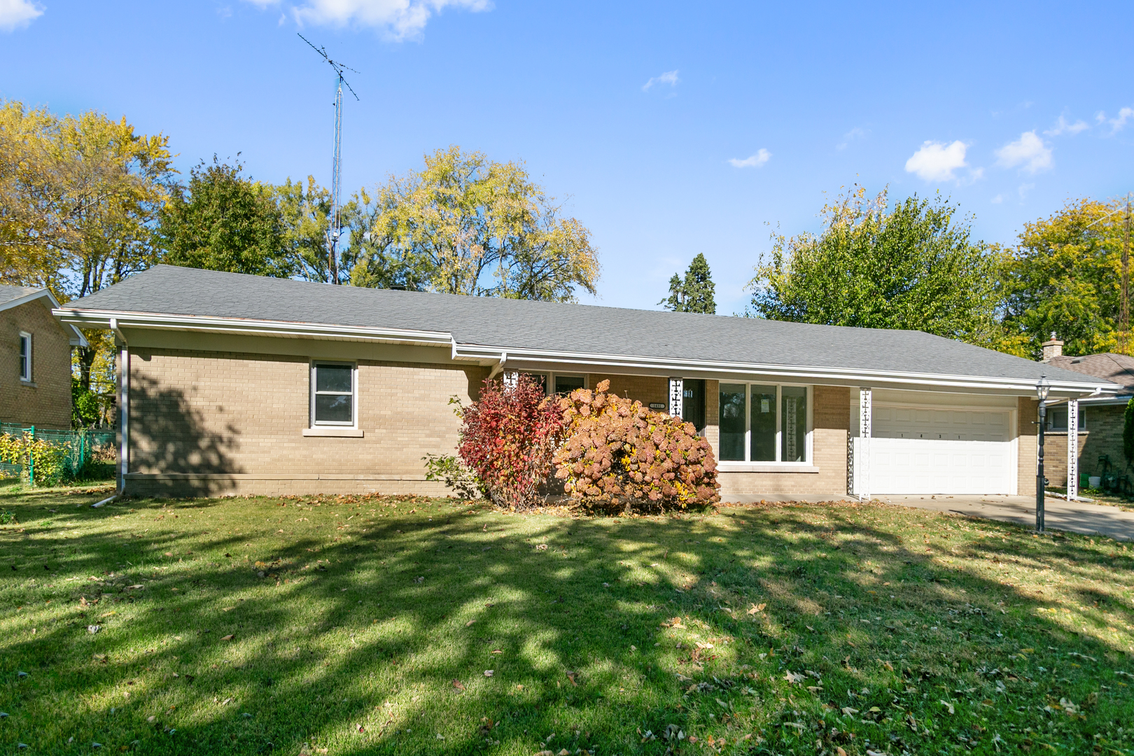 1431 West Vanmeter Street Kankakee, IL 60901 - Photo 2 of 19 a front view of a house with garden