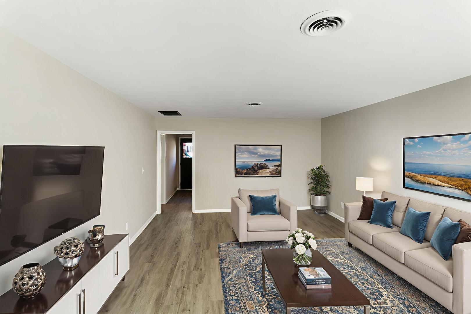 1431 West Vanmeter Street Kankakee, IL 60901 - Photo 3 of 19 a living room with furniture and a flat screen tv