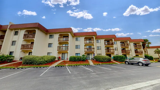 a cars parked in front of a building