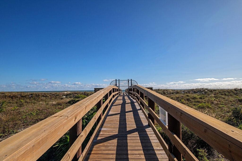 880 A1A Beach Boulevard, Unit 3207 St. Augustine, FL 32080 - Photo 24 of 33 a view of a balcony with wooden floor and city view