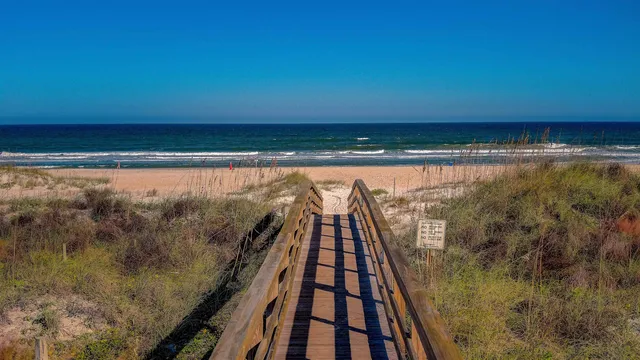 a view of balcony with wooden floor