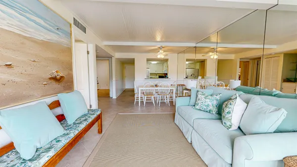 a living room with furniture and a table