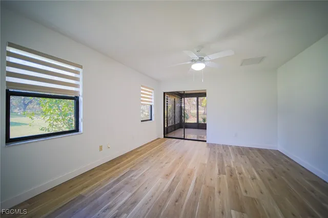 a bathroom with a double vanity sink and mirror