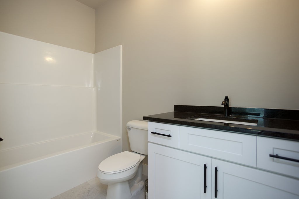 803 Oconner Smithville, TN 37166 - Photo 17 of 26 a view of a bathroom with a sink and a toilet