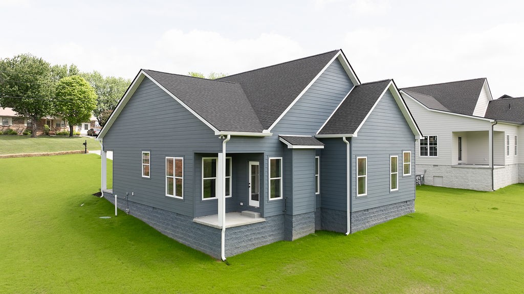 803 Oconner Smithville, TN 37166 - Photo 24 of 26 a front view of a house with a garden