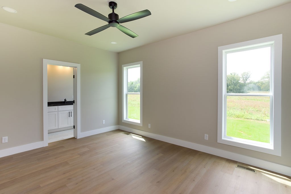 803 Oconner Smithville, TN 37166 - Photo 8 of 26 a view of empty room with wooden floor and fan