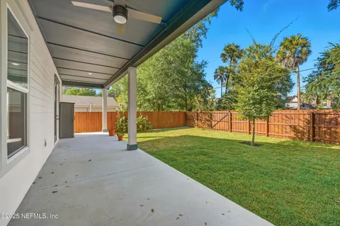 an aerial view of a house with a garden