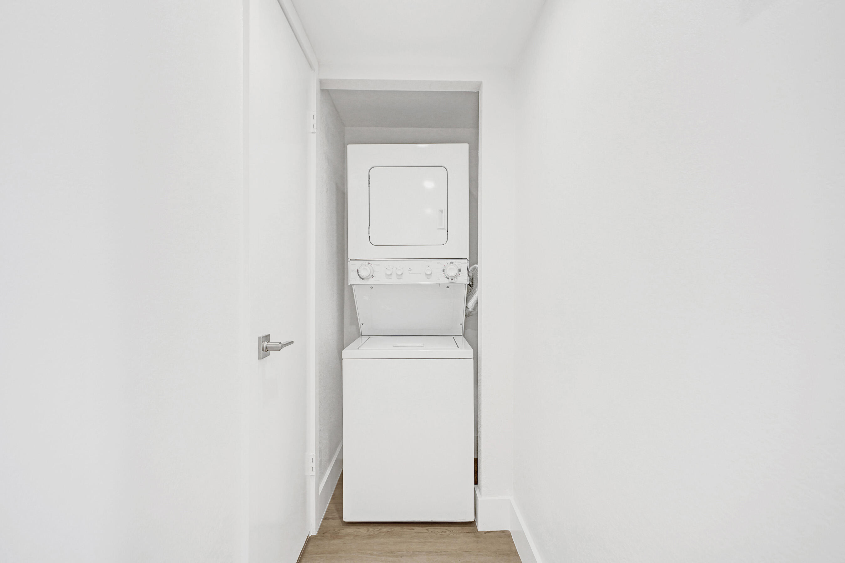 6195 Rock Island Road, Unit 413 Tamarac, FL 33319 - Photo 19 of 37 a utility room with a washer and dryer