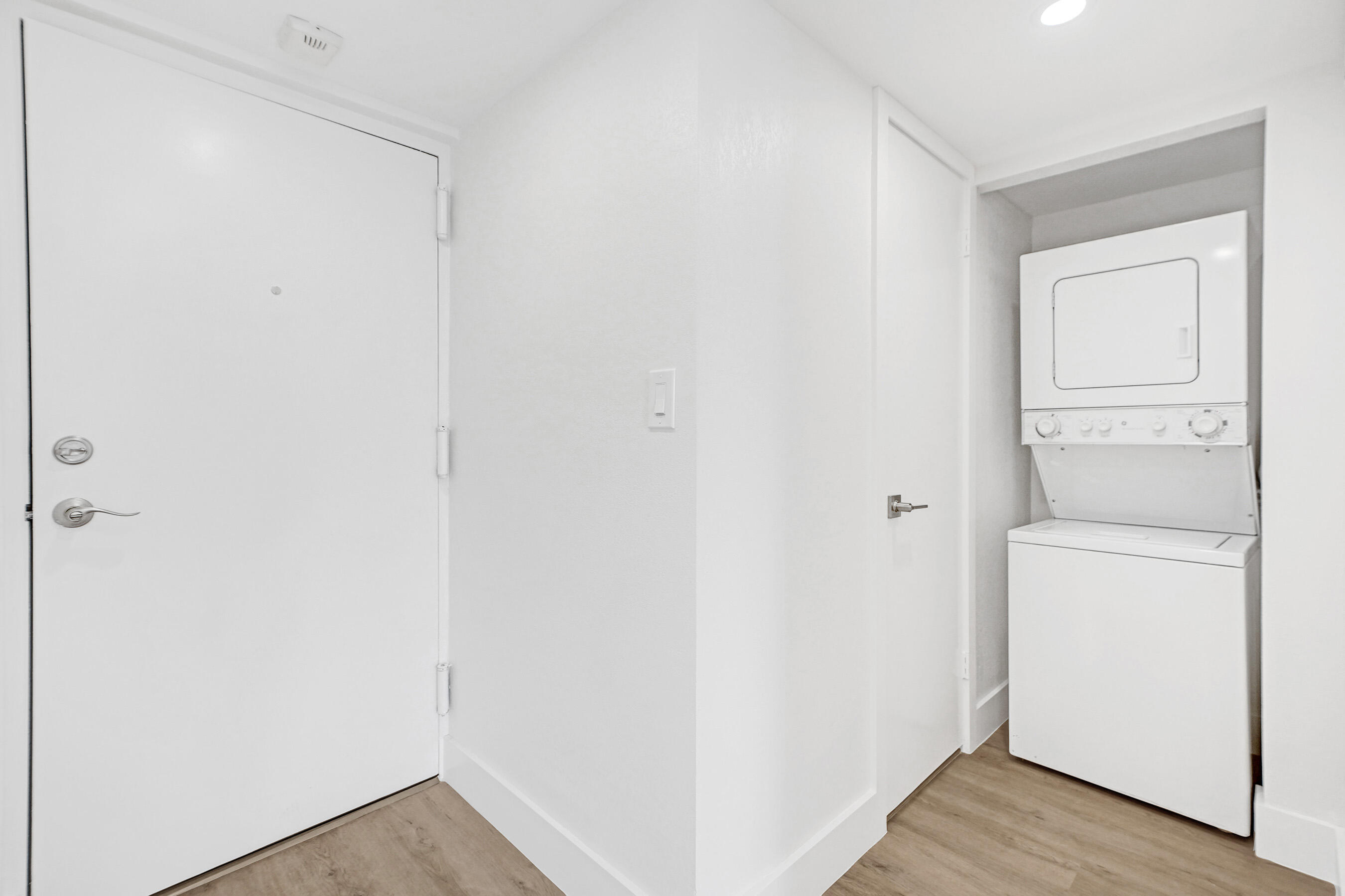 6195 Rock Island Road, Unit 413 Tamarac, FL 33319 - Photo 9 of 37 a view of a storage & utility room with a washer dryer