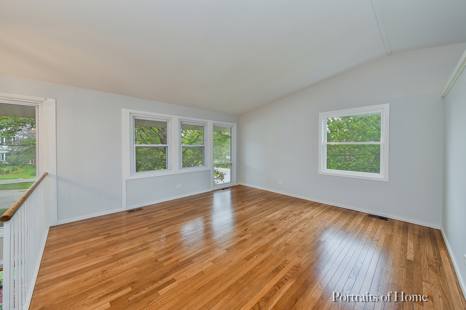 2S645 Bob O Link Road Lombard, IL 60148 - Photo 13 of 18 a view of an empty room with wooden floor and a window