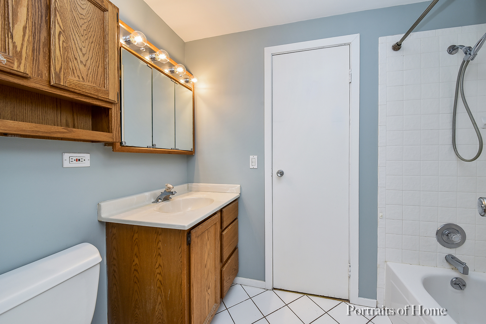 2S645 Bob O Link Road Lombard, IL 60148 - Photo 3 of 18 a bathroom with a sink a toilet and shower