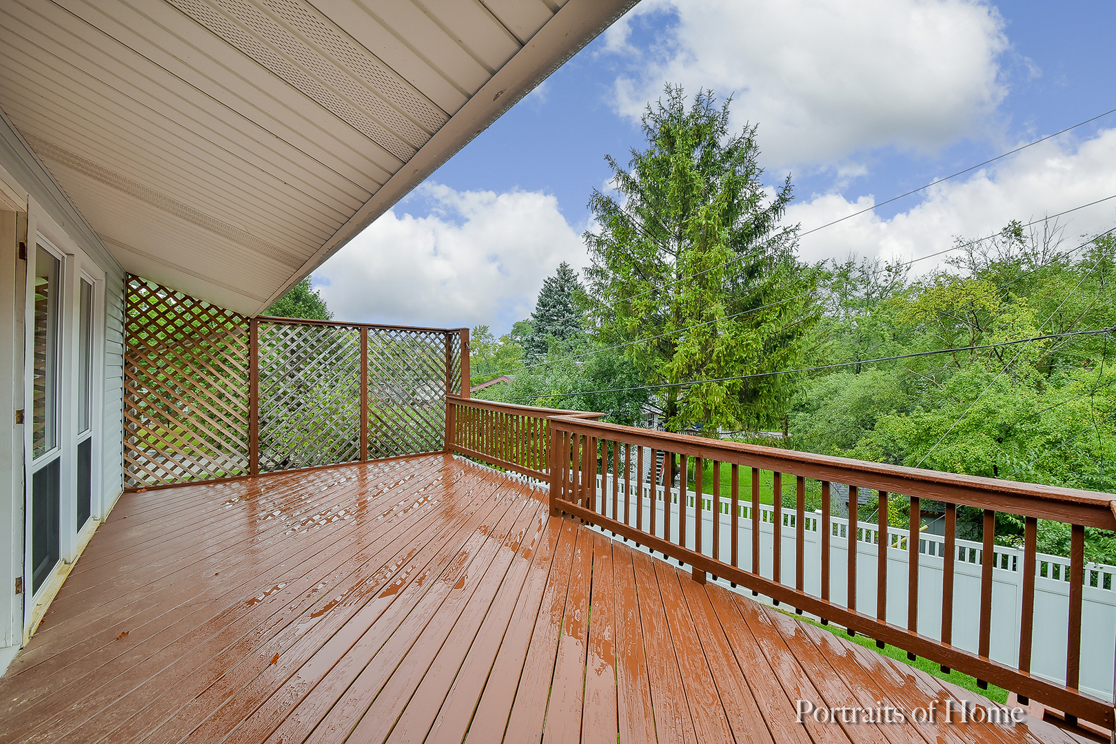 2S645 Bob O Link Road Lombard, IL 60148 - Photo 6 of 18 a balcony with wooden floor