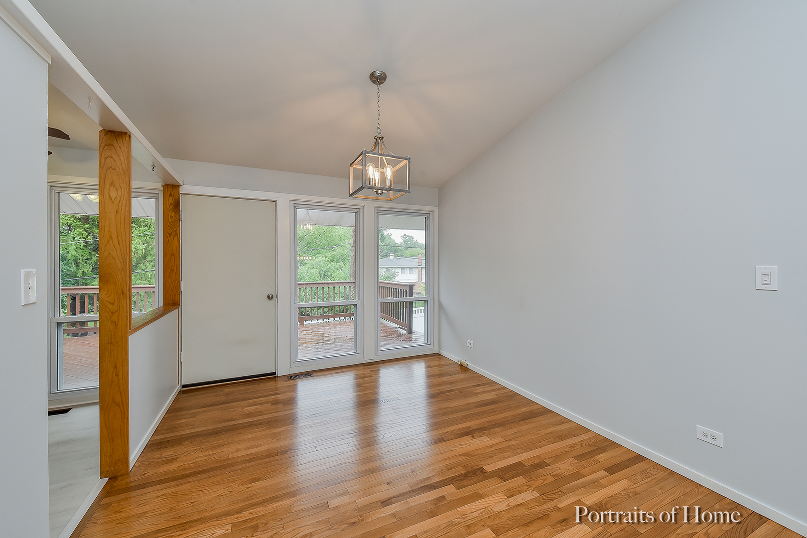 2S645 Bob O Link Road Lombard, IL 60148 - Photo 8 of 18 a view of an empty room with wooden floor and a window