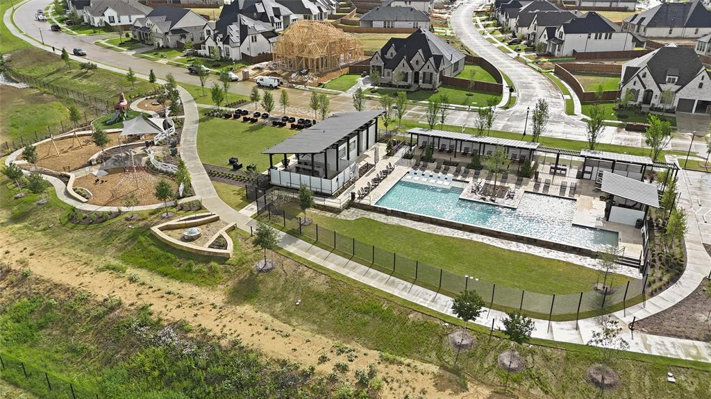 1701 Shetland Road Aubrey, TX 76227 - Photo 24 of 34 Newly completed second pool for the community along with a playground and a fire pit