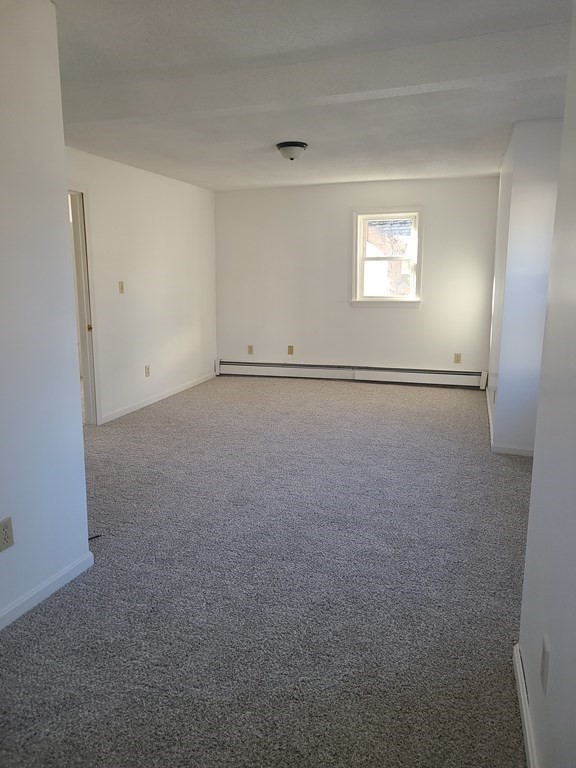 80 West Main Street Ware, MA 01082 - Photo 12 of 27 a view of an empty room with a window