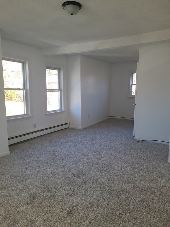 80 West Main Street Ware, MA 01082 - Photo 13 of 27 an empty room with windows