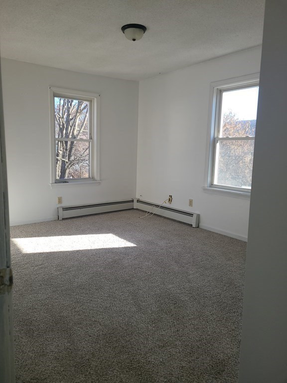 80 West Main Street Ware, MA 01082 - Photo 15 of 27 an empty room with a window