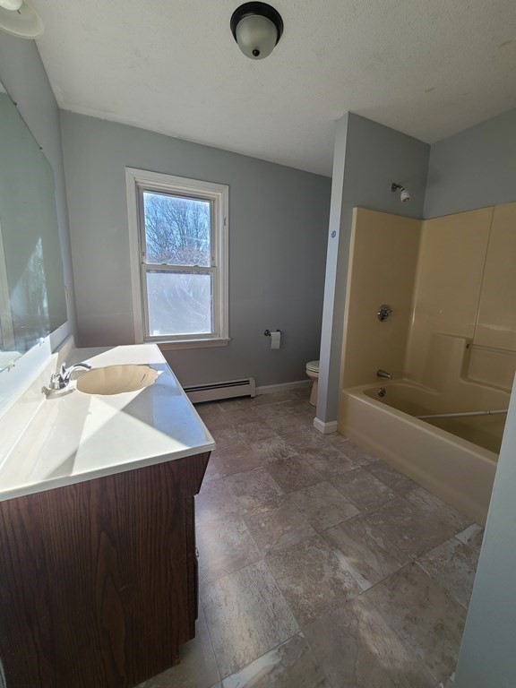 80 West Main Street Ware, MA 01082 - Photo 16 of 27 a bathroom with a sink and a mirror