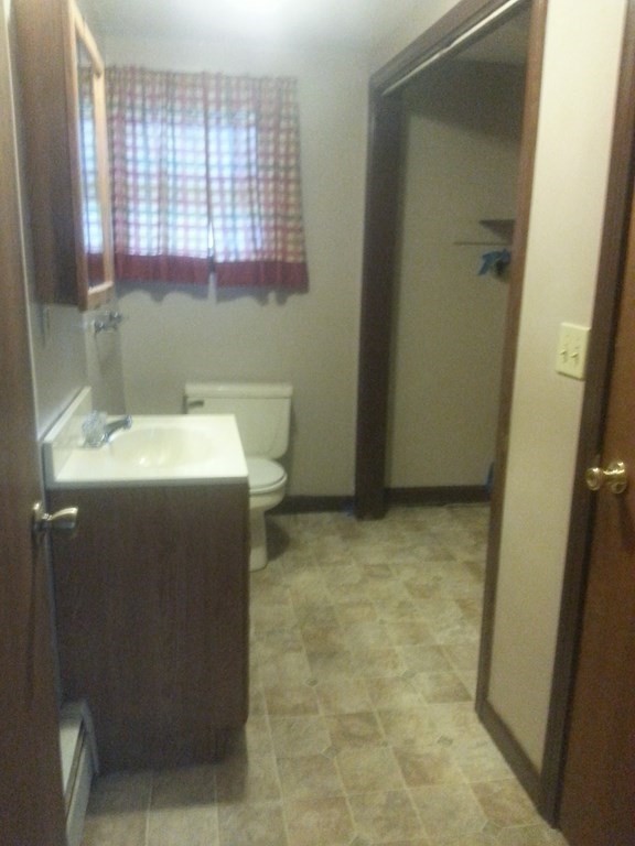 80 West Main Street Ware, MA 01082 - Photo 23 of 27 a bathroom with a sink toilet and shower