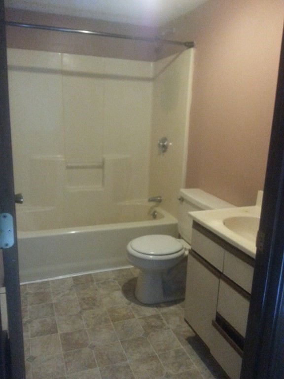 80 West Main Street Ware, MA 01082 - Photo 27 of 27 a bathroom with a toilet a sink and shower