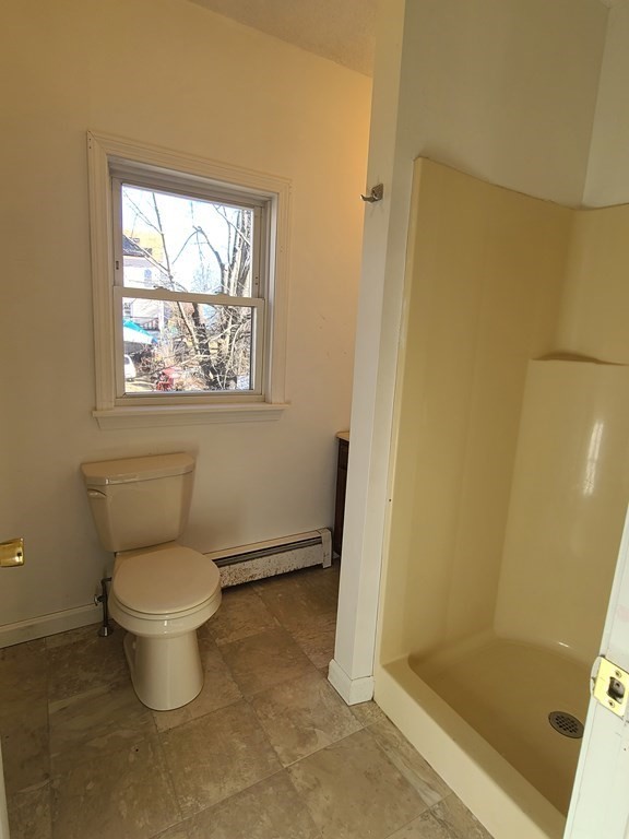 80 West Main Street Ware, MA 01082 - Photo 6 of 27 a bathroom with a toilet and a sink