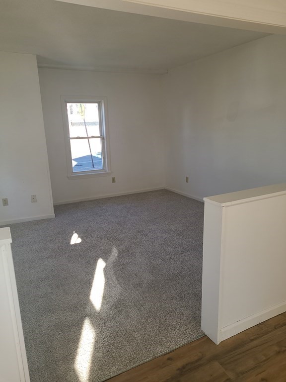 80 West Main Street Ware, MA 01082 - Photo 7 of 27 a view of empty room with wooden floor