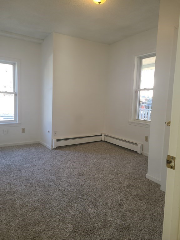 80 West Main Street Ware, MA 01082 - Photo 9 of 27 an empty room with a window