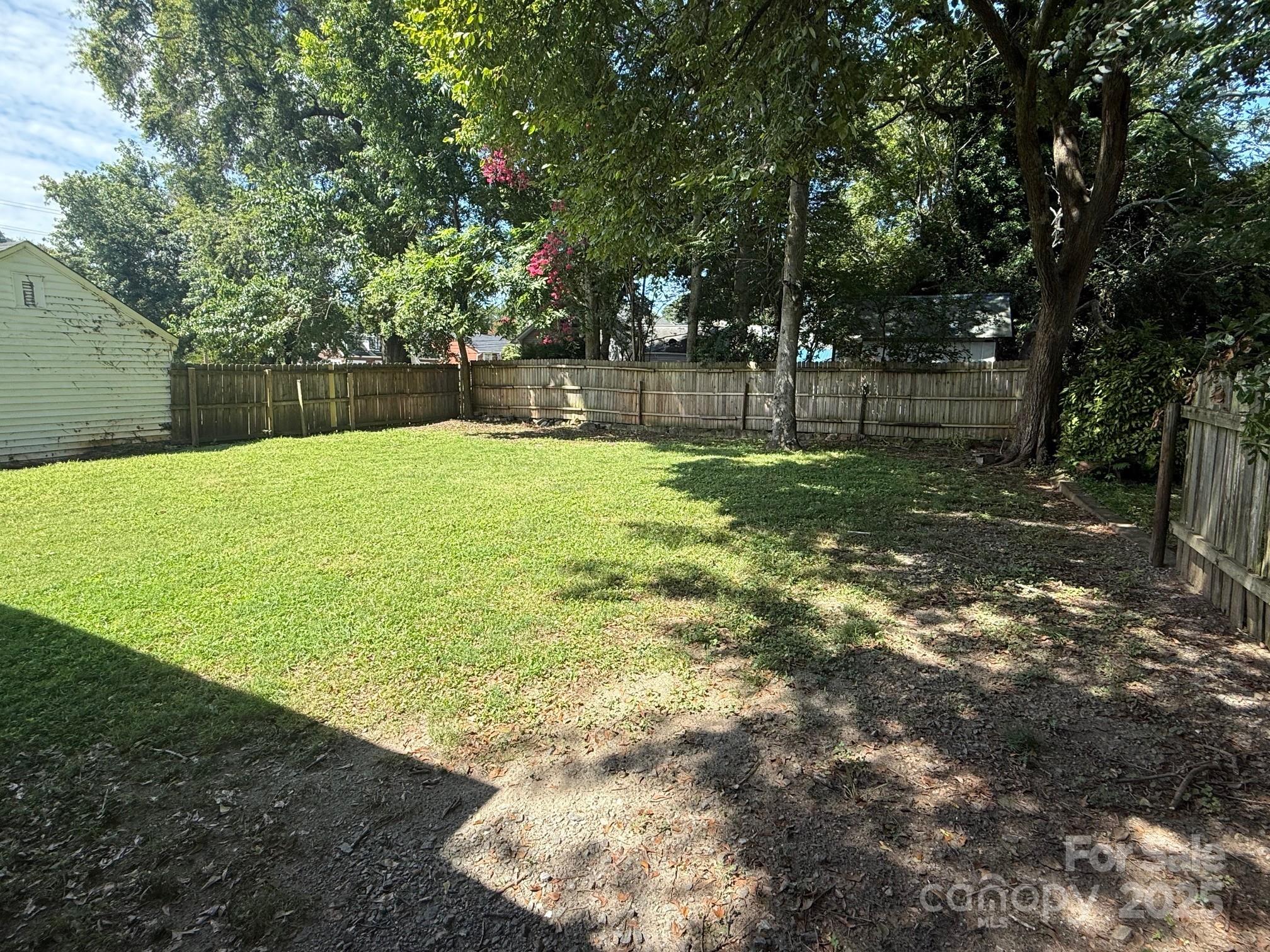326 South Cedar Street Lincolnton, NC 28092 - Photo 16 of 16 a view of a yard with a tree