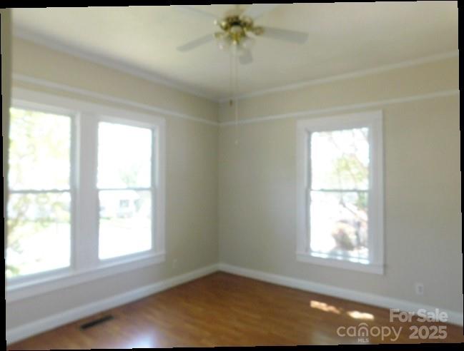 326 South Cedar Street Lincolnton, NC 28092 - Photo 7 of 16 an empty room with a window