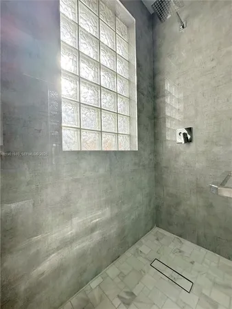 a view of a garage with stairs