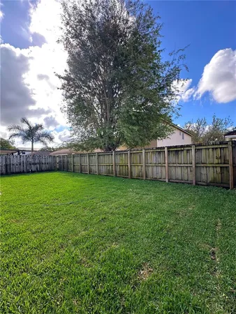 a view of a yard with a big yard
