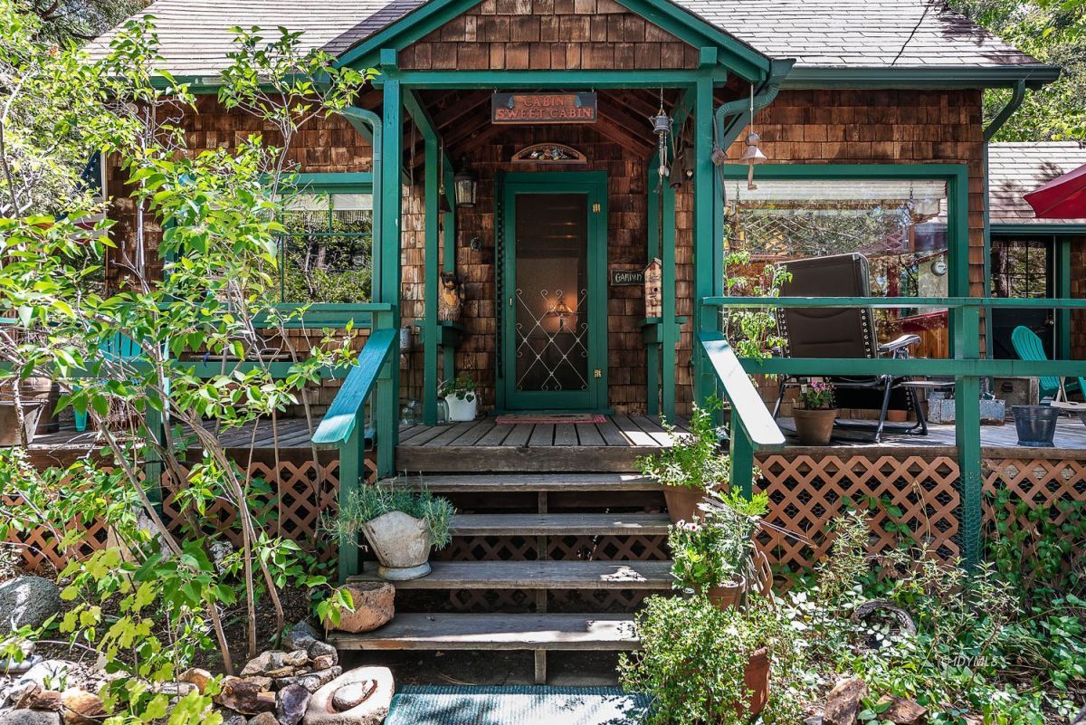 25440 Fern Valley Road Idyllwild, CA 92549 - Photo 3 of 32 a front view of a house with plants