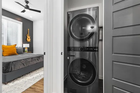 a bathroom with a double vanity sink and mirror