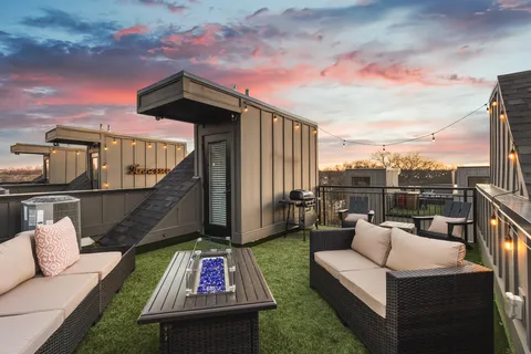 a bathroom with a shower and a sink