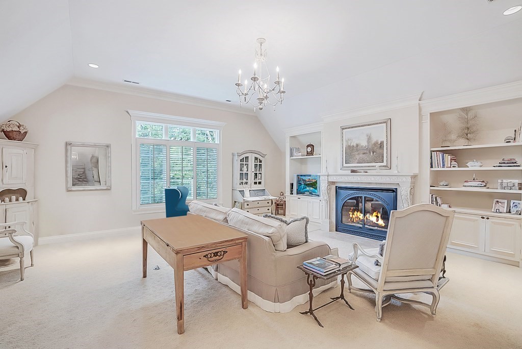 32 Bancroft Road Andover, MA 01810 - Photo 16 of 41 a living room with furniture a fireplace and a window
