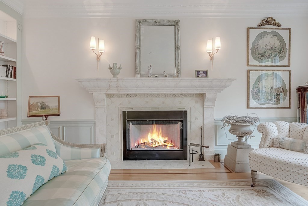 32 Bancroft Road Andover, MA 01810 - Photo 20 of 41 a living room with furniture and a fireplace