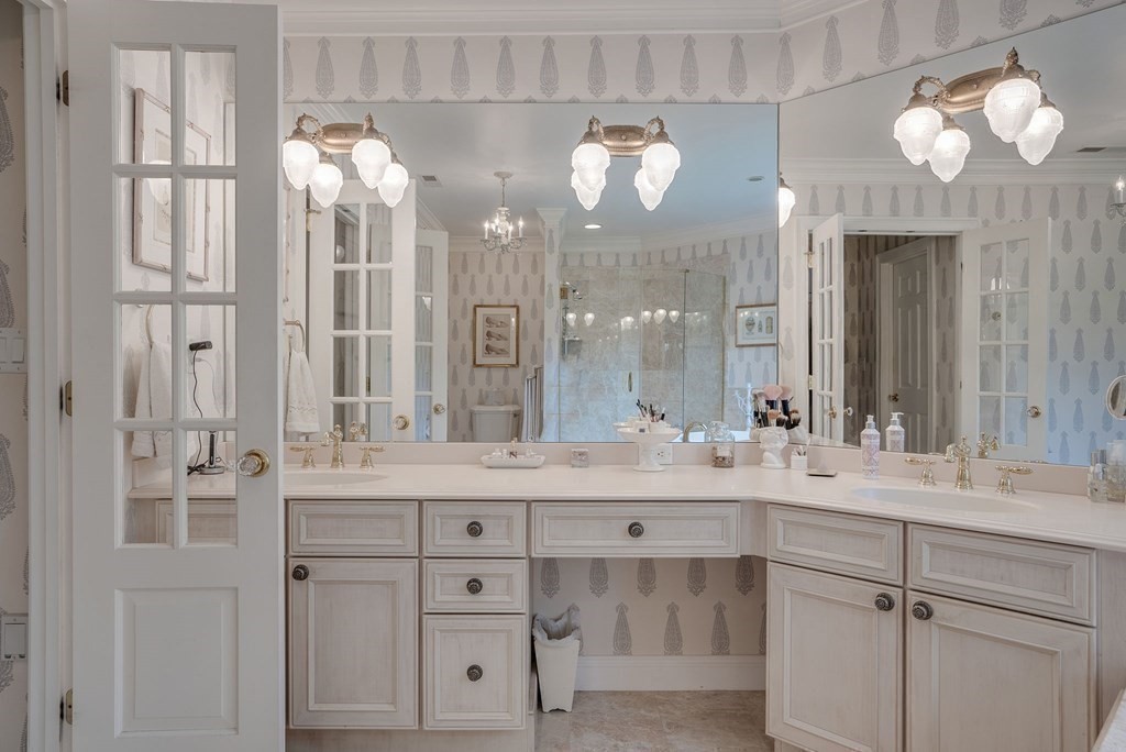 32 Bancroft Road Andover, MA 01810 - Photo 32 of 41 a bathroom with a double vanity sink mirror and double
